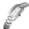 A close-up, angled shot of a silver women's watch with a rectangular face and a metal band, set against a white background. Produktbild-Vorschau