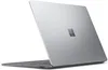 A silver Microsoft Surface Laptop 5 is shown from a diagonal rear view against a white background. Produktbild-Vorschau