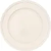 A single, cream-colored plate with a decorative rim is shown from a top-down view against a white background. Náhľad obrázku produktu