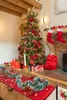 A festive Christmas scene with a decorated tree, fireplace, stockings, gifts, and a decorated table. Podgląd zdjęcia produktu