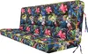 A tufted cushion with a tropical floral pattern, featuring large pink and white flowers with green and blue leaves on a dark background. It has yellow piping and ties. Náhľad obrázku produktu