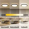 A split image showing a ceiling lamp in different color temperatures and lighting conditions, with furniture and decor in the background. Produktbild-Vorschau