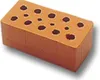 A single brown brick with dark brown circular holes on a white background. Náhľad obrázku produktu