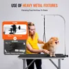 A woman grooming a dog on a grooming table, with a comparison of product fixtures. Anteprima dell’immagine prodotto