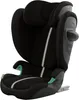 A black child car seat with gray and green accents, shown from a side-angle on a white background. Náhled obrázku produktu