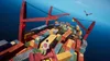 A person stands on a cargo ship filled with shipping containers, with a bird flying in the sky. Podgląd zdjęcia produktu