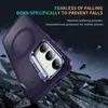 A close-up of a purple phone case with a magnetic ring, shown against a dark, rocky background with debris falling. Produktbild-Vorschau