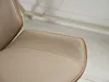 A close-up view of a chair's armrest and seat cushion, showing the stitching and trim. Anteprima dell’immagine prodotto