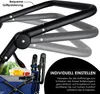 Close-up of a wagon handle and part of the wagon with contents. Produktbild-Vorschau