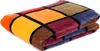 A folded blanket with a patchwork design. Produktbild-Vorschau