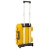 A yellow rolling tool case with a retractable handle against a white background. Voir les images du produit