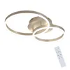 A modern LED ceiling light with two intertwined rings, shown against a white background. A remote control is placed in the bottom right corner. Podgląd zdjęcia produktu