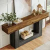 A console table with decorative items on it, placed against a white paneled wall. Anteprima dell’immagine prodotto