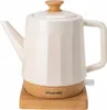 A white ceramic electric kettle with a wooden lid and base, shown on a wooden base. Produktbild-Vorschau