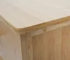 A close-up view of the corner of a bamboo chest of drawers. Produktbild-Vorschau