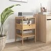 A bamboo nightstand with a drawer and shelves is placed next to a wooden cabinet, with a large potted plant to the left. Náhled obrázku produktu
