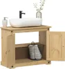 A bathroom vanity with a sink and faucet, a soap dispenser, and a basket of towels. Náhled obrázku produktu