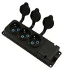 A black power strip with three covered outlets against a white background. Anteprima dell’immagine prodotto
