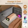 A bed with built-in charging ports and devices being charged. Voir les images du produit