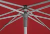Close-up view of the internal structure of a red umbrella, showing the pole, ribs, and central mechanism. Produktbild-Vorschau