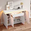 A white sideboard with LED lighting, open doors and a drawer, displaying various items inside. Anteprima dell’immagine prodotto