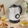 A stainless steel electric kettle with a temperature gauge is placed on a wooden table, next to glasses of tea and pastries. Produktbild-Vorschau