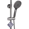A close-up view of a showerhead and its adjustable rail, with a warranty tag hanging from the rail. Produktbild-Vorschau
