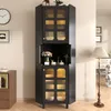 A tall, black corner cabinet with glass doors and gold accents, displayed in a room setting with a clock and a lamp. Anteprima dell’immagine prodotto