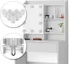 A white vanity table with a mirror and LED lights, along with some accessories. Podgląd zdjęcia produktu
