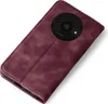 A burgundy flip case for a smartphone, shown from the back with the camera module visible. Produktbild-Vorschau