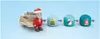 A Santa Claus figure pulling a sleigh with three toy-like modules behind it, against a light blue background. Podgląd zdjęcia produktu