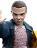 A close-up shot of a WETA Workshop Mini Epics figure of Eleven from Stranger Things, holding a box of waffles. Náhled obrázku produktu