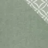 A close-up view of a fabric with a geometric pattern. Náhľad obrázku produktu
