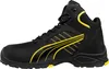A black and yellow Puma safety boot is shown against a white background. Voir les images du produit