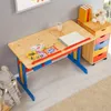 A child's desk and storage unit are set up in a room. Produktbild-Vorschau
