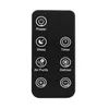 A black remote control with white icons and text for a dehumidifier. Náhled obrázku produktu