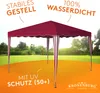 A red and white striped gazebo is set up on a green lawn with a sunny sky in the background. Text overlays highlight product features. Produktbild-Vorschau