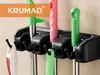 KRUMAD Supporto da parete per scope, 3 ripiani e 4 ganci Anteprima dell’immagine prodotto 2