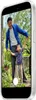 A man and a child are posing for a photo outdoors, with the iPhone displaying the photo. Podgląd zdjęcia produktu