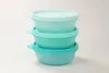 A stack of three Tupperware containers in varying shades of turquoise. Anteprima dell’immagine prodotto