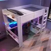 A loft bed with a desk and gaming setup underneath, illuminated by LED lights. Produktbild-Vorschau