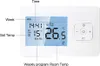 A digital thermostat with a screen displaying time, temperature, and day of the week, along with control buttons. Podgląd zdjęcia produktu