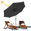 A dark gray patio umbrella is set up over two wooden lounge chairs with pillows and drinks, with a sun graphic indicating shade. Voir les images du produit