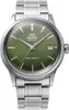 A close-up studio shot of a silver and green Orient automatic watch. Produktbild-Vorschau