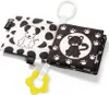 A black and white fabric baby book with animal illustrations and a yellow teething ring. Produktbild-Vorschau