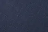 A close-up, textured view of dark blue fabric. Produktbild-Vorschau