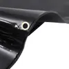 A close-up view of a black tarp with grommets. Produktbild-Vorschau
