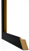 A close-up view of a black picture frame corner, showing the profile and the raw MDF material on the inside. Produktbild-Vorschau