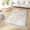 A modern living room with a sofa, coffee table, and a geometric patterned rug. Produktbild-Vorschau