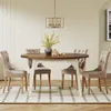 A dining table with four chairs in a well-lit room. Náhľad obrázku produktu